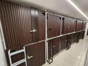 a row of brown lockers in a building at Capsule CDMX in Mexico City