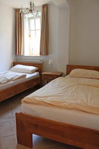 Säng eller sängar i ett rum på Villa Friedericia - Appartment 1