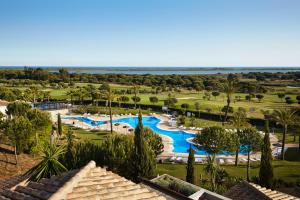 an aerial view of the pool at the resort at Precise Resort El Rompido-The Hotel in El Rompido