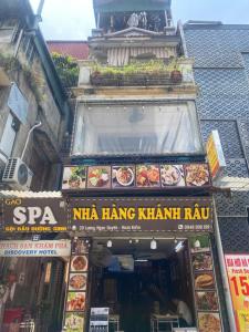 a restaurant with a sign that reads nha hang khanra at Downtown Hostel HANOI & HA GIANG LOOP TOUR OFFICE in Hanoi +5 photos