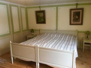 Postel nebo postele na pokoji v ubytování Thorstorps Gård B&B