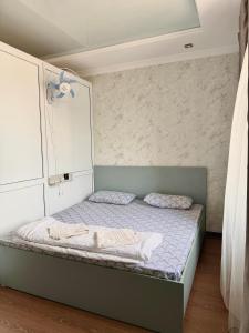 Lova arba lovos apgyvendinimo įstaigoje Kut Hotel Osh