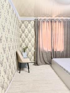 Lova arba lovos apgyvendinimo įstaigoje Kut Hotel Osh