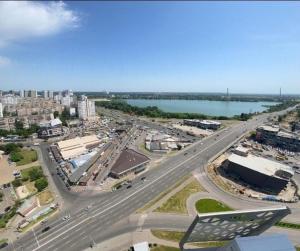 an aerial view of a city with a highway at Супер Видові апартаменти метро Позняки Харківська in Kyiv