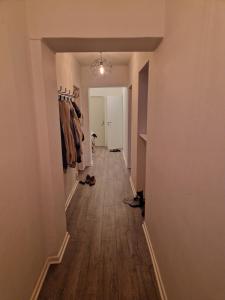 a hallway of an empty house with a hallwayngthngthngthngthngthngthngth at great apartment in Gothenburg