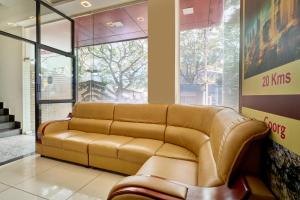 a waiting room with a couch in a store at Itsy Hotels NRM Residency - Near Mysore Palace in Mysore