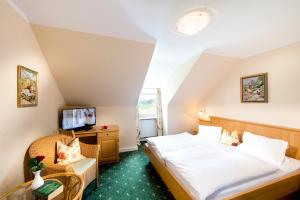 Postel nebo postele na pokoji v ubytování Hotel Walkner