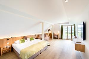 Postel nebo postele na pokoji v ubytování Hotel Walkner