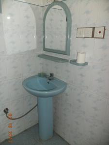 Koupelna v ubytování Raja174 Homestay
