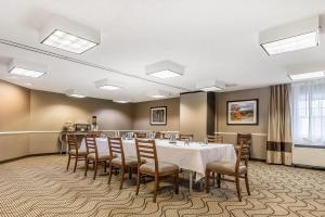 a conference room with a long table and chairs at Comfort Inn Concord South End in Concord +18 photos