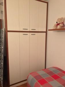 A bed or beds in a room at Appartamento Bernasconi