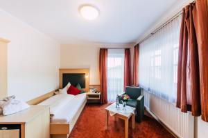 Postel nebo postele na pokoji v ubytování Wellness- und Wohlfühlhotel Waldeck