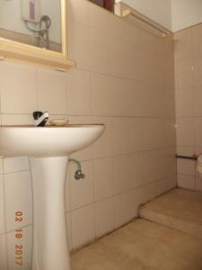 Koupelna v ubytování Raja174 Homestay