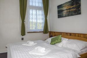 Posteľ alebo postele v izbe v ubytovaní Hotel Garni Belveder + 37 fotografií