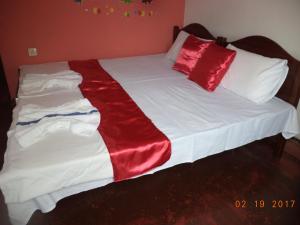 Postel nebo postele na pokoji v ubytování Raja174 Homestay