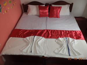 Postel nebo postele na pokoji v ubytování Raja174 Homestay