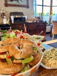 a group of sandwiches on plates on a table at Sarenka in Białka Tatrzańska +79 photos