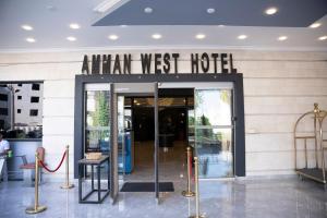 an entrance to an entrance to an art west hotel at Amman West Hotel , A Boutique Hotel in Amman