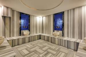 a rendering of a dressing room with blue windows at Grande Arte Hotel in Eskisehir
