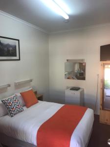 Postel nebo postele na pokoji v ubytování Sturt Motel