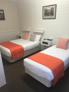 Postel nebo postele na pokoji v ubytování Sturt Motel