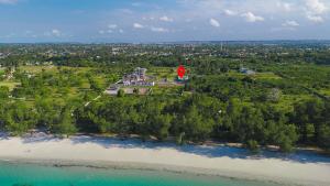 an aerial view of a house on a island next to a river at Geza Breeze Residence in Dar es Salaam
