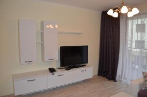 TV a/nebo společenská místnost v ubytování Real Black Sea Apartments