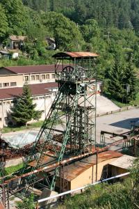 a metal tower sitting on top of a building at Gordana in Senjski Rudnik +9 photos
