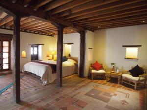 Letto o letti in una camera di The Inn Patan
