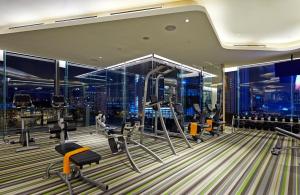 a gym with a view of a city at VE Hotel & Residence in Kuala Lumpur