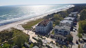 an aerial view of a house and the beach at Bella Casa 34 - Strandblick in Juliusruh