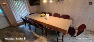 a conference room with a table and chairs at Vilimu Sodyba - Stone Hall in Kriukai