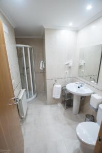 Ванная комната в Hotel El Roble