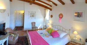 En eller flere senge i et værelse på Villa Vetricella Corse Sud