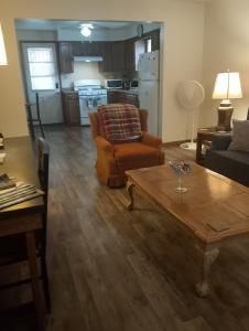 a living room with a couch and a coffee table at Simple Stay in Youngstown