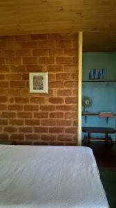 Postel nebo postele na pokoji v ubytování Pousada Sempre Viva