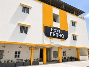 a hotel ferro is shown in front of a building at Hotel Ferro in Kumbalgod