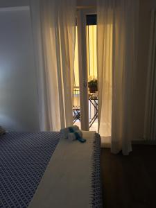 Postel nebo postele na pokoji v ubytování B&B Il Saraceno
