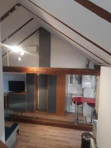 a view of a living room from the attic at Loft przy Starym Mieście in Jarosław