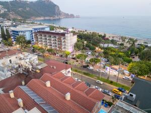 an aerial view of a city and the ocean at Miray Hotel Kleopatra in Alanya