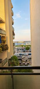 a balcony with a view of a parking lot at Apt Puerto Burriana in Burriana