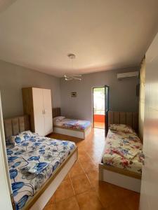 a bedroom with two beds in a room at Ankor view in Shëngjin