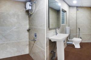 a bathroom with a toilet and a sink and a shower at Collection O Dehu Alandi Road Formerly KP Pride in Dehu
