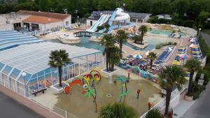 an aerial view of a swimming pool at a resort at Camping les sables in Aytré