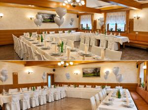 a banquet hall with white tables and white chairs at Gostišče Krka in Znojile pri Krki