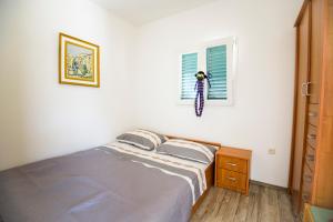 Posteľ alebo postele v izbe v ubytovaní Sunny Side Apartments