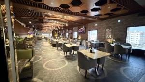 Restoranas ar kita vieta pavalgyti apgyvendinimo įstaigoje Seven Gardens Hotel