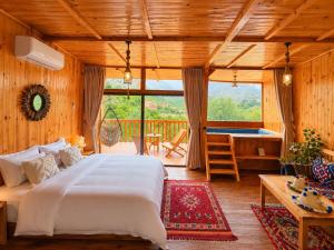 a bedroom with a bed and a pool table at Afla views in Imlil