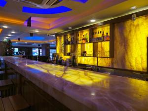 a bar with a long counter in a restaurant at Burdur Park Prestij Otel in Burdur +18 photos