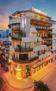 a rendering of a building with balconies at XHOME Danang Hotel & Suite - Near My Khe Beach in Danang